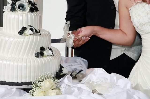 A bride cake cutting ceremony