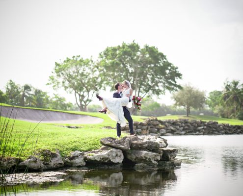 A couple at a bank of lake