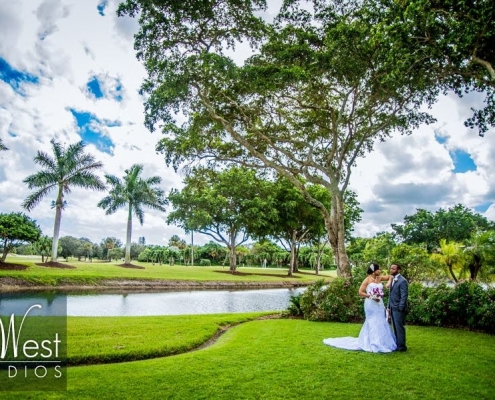 A couple in lush green area