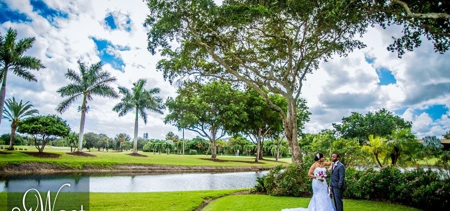 A couple in lush green area